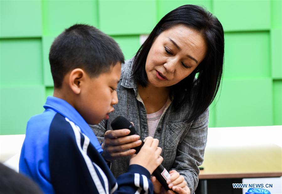 CHINA-INNER MONGOLIA-HOHHOT-VISUALLY IMPAIRED-CINEMA-POEM-VOLUNTEER (CN)