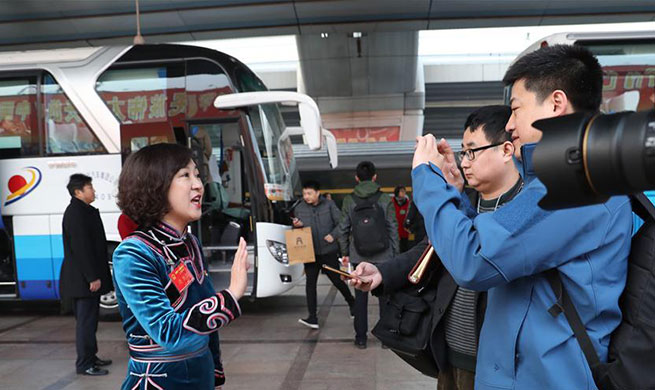 Deputies to 13th NPC from China's Heilongjiang arrive in Beijing