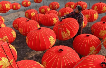 Workers prepare lanterns for upcoming new year in China's Shanxi