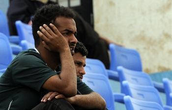 People watch televised World Cup match in Sanaa, Yemen